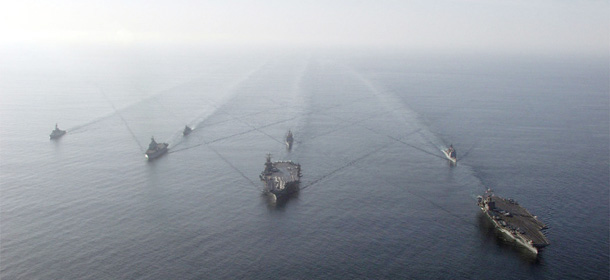 398452 13: United States aircraft carriers USS Theodore Roosevelt, USS Carl Vinson, and guided missile cruisers USS Vella Gulf, USS Antietam are joined by the Italian aircraft carrier ITS Garibaldi and guided missile frigate ITS Zeffiro, and the Canadian guided missile destroyer HMCS Iroquois as they sail in formation December 9, 2001 in the Northern Arabian Sea. The ships are part of the coalition task force supporting Operation Enduring Freedom. (Photo by US Navy/Getty Images)