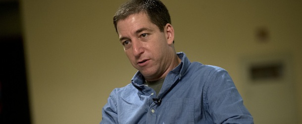 Journalist Glenn Greenwald speaks during an interview with the Associated Press in Rio de Janeiro, Brazil, Sunday, July 14, 2013. Greenwald, The Guardian journalist who first reported Edward Snowden's disclosures of U.S. surveillance programs says the former National Security Agency analyst has "very specific blueprints of how the NSA do what they do."(AP Photo/Silvia Izquierdo)