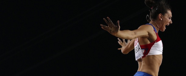 Russia's Elena Isinbaeva competes in the women's pole vault final at the International Association of Athletics Federations (IAAF) World Championships in Daegu on August 30, 2011. AFP PHOTO / ADRIAN DENNIS (Photo credit should read ADRIAN DENNIS/AFP/Getty Images)