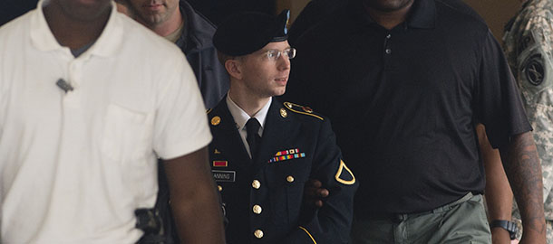US Army Private First Class Bradley Manning departs a US military court facility as the sentencing phase continues in his trial at Fort Meade, Maryland on August 20, 2013. A US military judge has said she will announce a sentence on August 21, 2013 for Manning, the soldier convicted of espionage for giving classified government documents to WikiLeaks. AFP PHOTO / Saul LOEB (Photo credit should read SAUL LOEB/AFP/Getty Images)