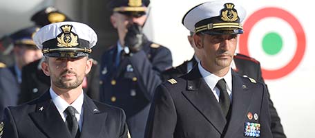 (FILES) This photograph taken on December 22, 2012, Italian marines Massimiliano Latorre (R) and Salvatore Girone (L) arrive at Ciampino airport near Rome. Italy's deputy foreign minister Staffan de Mistura urged India on March 22, 2013,to bring two Italian marines facing murder charges to court quickly as they returned to face trial in New Delhi. The marines were arrested in India in February 2012 after shooting dead two fishermen while guarding an Italian oil tanker sailing off India's southwestern coast. AFP PHOTO/ VINCENZO PINTO/ FILES (Photo credit should read VINCENZO PINTO/AFP/Getty Images)
