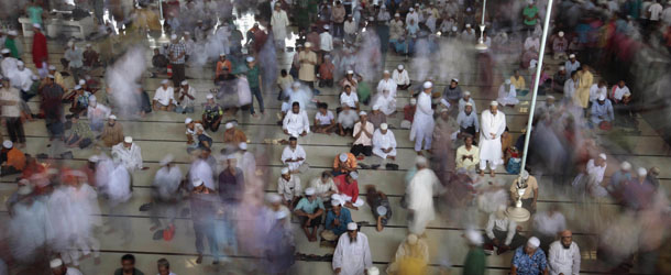 Bangladeshi Muslims pray at Baitul Mukaram mosque on Jumat-ul-wida, the last Friday of the Islamic holy month of Ramadan in Dhaka, Bangladesh, Friday, Aug. 2, 2013. Muslims across the world refrain from eating, drinking and smoking from dawn to dusk during Ramadan. (AP Photo/A.M. Ahad)