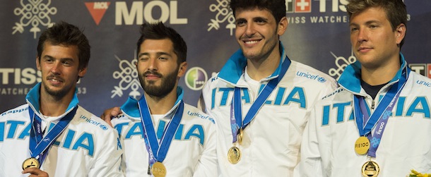 Members of the Italy team from left, Andrea Baldini, Giorgio Avola, Andrea Cassara and Valerio Aspromonte celebrate after winning gold against the US in the final of the men’s foil team competition at the World Fencing Championship Budapest, Hungary, Monday, Aug. 12, 2013. (AP Photo/MTI, Tibor Illyes)
