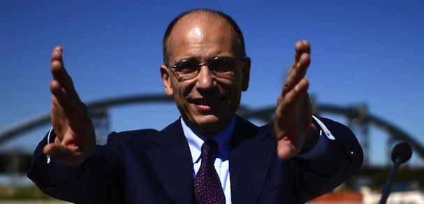 Italian Prime Minister Enrico Letta gestures during a press conference following his visit of the construction site of the future Universal Exposition hosted by Milan on September 13, 2013 in Rho, near Milan. AFP PHOTO / OLIVIER MORIN (Photo credit should read OLIVIER MORIN/AFP/Getty Images)