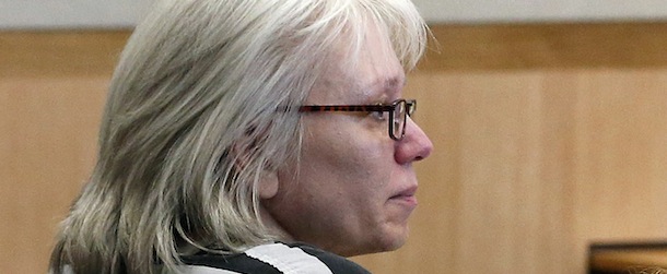 FILE - In this Aug. 1, 2013 file photo, Debra Jean Milke listens to a judge during a hearing as she awaits a retrial in the 1989 shooting death of her 4-year-old son, Christopher, at Maricopa County Superior Court in Phoenix. A judge is allowing Milke to be released on bail as she awaits retrial in the 1989 killing of her young son, a case that had her on death row since 1990 until her conviction was overturn this year. (AP Photo/Ross D. Franklin, Pool, File)