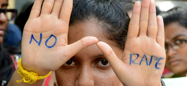 Indian students of Saint Joseph Degree college participate in an anti-rape protest in Hyderabad on September 13, 2013. The judge hearing the case of four men convicted for a shocking gang rape on a bus in New Delhi in December 2012 sentenced them to death. AFP PHOTO / Noah SEELAM (Photo credit should read NOAH SEELAM/AFP/Getty Images)