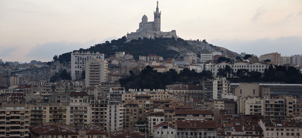 View taken on January 9, 2013 of the "Vieux-Port" (Old Harbour) and the Notre-Dame-de-la Garde basilica in the French southern city of Marseille, two days ahead of the 2013 "Marseille-Provence European Capital of Culture" event. AFP PHOTO/GERARD JULIEN (Photo credit should read GERARD JULIEN/AFP/Getty Images)