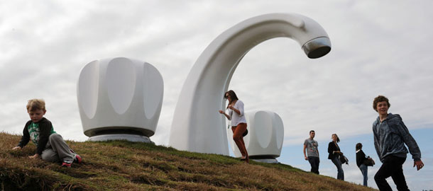 Australian artist Simon McGrath's fibreglass work 'Who Left The Tap Running' dominates the Bondi headland during the launch of the 15th annual Sculpture By The Sea exhibition in Sydney on November 3, 2011. Works by over 100 artists from around the world are on display along the sandstone cliffs of the Pacific coast until November 20. AFP PHOTO / Torsten BLACKWOOD (Photo credit should read TORSTEN BLACKWOOD/AFP/Getty Images)