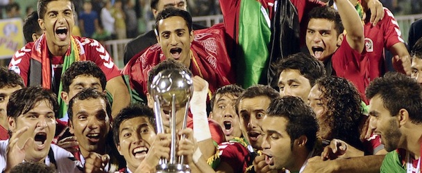 Afghanistan's players celebrate with the trophy, following their victory over India in the SAFF Championship football Cup final match in Kathmandu on September 11, 2013. Afghanistan won the match 2-0. AFP PHOTO/Prakash MATHEMA (Photo credit should read PRAKASH MATHEMA/AFP/Getty Images)