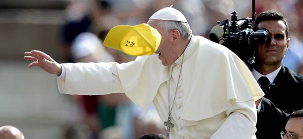 A cap fly next to Pope Francis upon his arrival in St Peter's square at the Vatican on September 11, 2013 , for his weekly general audience. AFP PHOTO / FILIPPO MONTEFORTE (Photo credit should read FILIPPO MONTEFORTE/AFP/Getty Images)