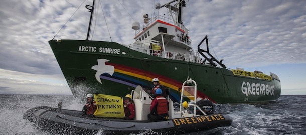 This image made available by environmental organization Greenpeace shows the Greenpeace ship Arctic Sunrise entering the Northern Sea Route (NSR) off Russia's coastline to protest against Arctic oil drilling, Saturday, Aug. 24, 2013. The sign reads "Save the Arctic!" The environmental group Greenpeace says one of its ships has defied Russian authorities and entered Arctic waters to protest against oil drilling. Greenpeace says Russia this week denied permission for its Arctic Sunrise ship to enter the Kara Sea, a section of the Arctic Ocean off Siberia. The group is protesting offshore oil exploration adjacent to Russia's Arctic National Park, which is habitat for polar bears, walrus and other animals. The exploration is being conducted by state oil company Rosneft and ExxonMobil. (AP Photo/Will Rose, Greenpeace,) NO ARCHIVE