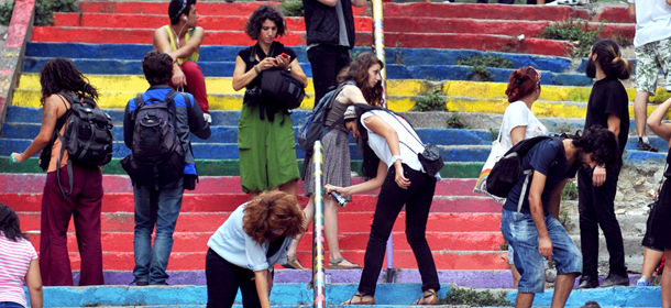 People paint rainbow-colored stairs on August 31, 2013 in Istanbul. Stairs in the Cihangir and Findikli neighborhoods, which attracted attention after being painted in rainbow colors by a local man on August 27, were all painted grey on the night of August 29, and following comments on social media, the municipality of Beyoglu immediately painted them again in rainbow colors. AFP PHOTO/OZAN KOSE (Photo credit should read OZAN KOSE/AFP/Getty Images)