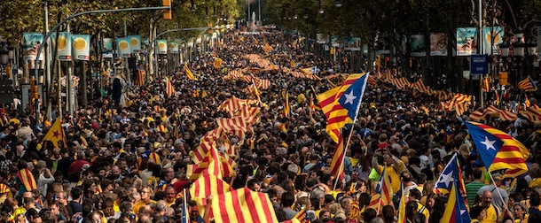 BARCELONA, SPAIN - SEPTEMBER 11: Demonstrators march during The National Day of Catalonia on September 11, 2013 in Barcelona, Spain. Thousands of Catalans celebrating the 'Diada Nacional' are holding demostrations to demand the right to hold a self-determination referendum next year. (Photo by David Ramos/Getty Images)