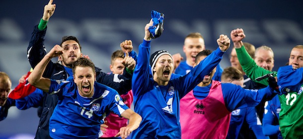 Icelands team celebrates after the FIFA World Cup 2014 group E qualifying football match between Norway and Iceland at Ullevaal stadium in Oslo, Norway october 15, 2013 AFP PHOTO NTB SCANPIX Erlend Aas (Photo credit should read AAS ERLEND/AFP/Getty Images)
