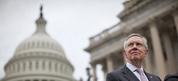 Senate Majority Leader Harry Reid of Nev. stands on the Senate steps on Capitol Hill in Washington, Wednesday, Oct. 9, 2013, during a news conference on the ongoing budget battle. President Barack Obama was making plans to talk with Republican lawmakers at the White House in the coming days as pressure builds on both sides to resolve their deadlock over the federal debt limit and the partial government shutdown. (AP Photo/ Evan Vucci)

