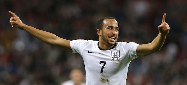 England's Andros Townsend celebrates after scoring a goal against Montenegro during the World Cup Group H qualification soccer match between England and Montenegro at Wembley stadium in London, Friday, Oct. 11, 2013 . (AP Photo/Sang Tan)