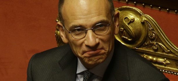 Italian Premier Enrico Letta prepares to deliver his speech at the Senate, in Rome, Wednesday, Oct. 2, 2013. Letta was putting his government's survival to confidence votes in Parliament on Wednesday amid a divisive split in Silvio Berlusconi's party that could at least temporarily save his fragile ruling coalition. (AP Photo/Gregorio Borgia)