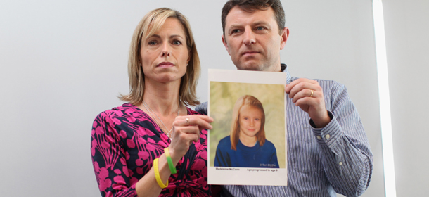 LONDON, ENGLAND - MAY 02: Kate and Gerry McCann hold an age-progressed police image of their daughter during a news conference to mark the 5th anniversary of the disappearance of Madeleine McCann, on May 2, 2012 in London, England. The McCann's today stated that there is "no doubt" that authorities will re-open the investigation into their daughter's disappearance. Three-year-old Madeleine went missing while on holiday with her parents in the Algarve region of Portugal in May 2007. (Photo by Dan Kitwood/Getty Images)