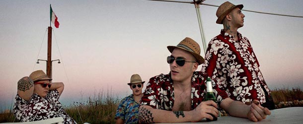 Membri di uno storico gruppo Skinhead italiano, qui durante l'Hawaian party, una festa annuale organizzata in spiaggia (sulle coste laziali) dove gli invitati devono indossare camicie hawaiane. 
Giugno 2010.