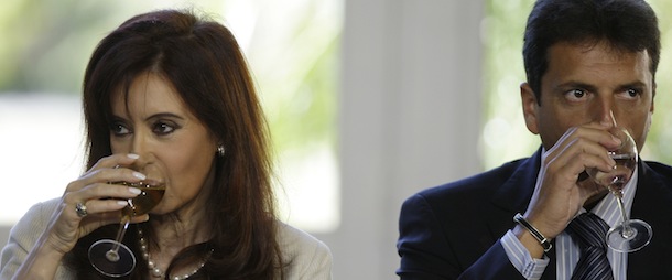 FILE &#8211; In this Jan. 14, 2009 file photo, Argentina&#8217;s President Cristina Fernandez, left, and her Chief of Cabinet Sergio Massa take a sip of water at the presidential residence in Buenos Aires, Argentina. Argentina’s leading opposition candidate for congress and mayor of Buenos Aires&#8217; Tigre district Sergio Massa, was robbed at his home on July 20, 2013, allegedly by Alcides Diaz Gorgonio, a navy intelligence agent who works in the security ministry under Sergio Berni, who answers to the president. He was detained after local police found Massa’s pen-drives in his house. Massa used to be Fernandez&#8217;s Cabinet chief, but now he seems to be her biggest threat, leading an opposition slate that could end her control of congress. (AP Photo/Natacha Pisarenko, File)

