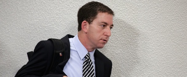 American journalist Glenn Greenwald arrives to speaks before a congressional committee investigating reports based on documents, leaked by former National Security Agency contractor Edward Snowden, showing that Brazil was targeted by spy agencies from the U.S., Britain and Canada, at Congress in Brasilia, Brazil, Wednesday, Oct. 9, 2013. Greenwald, the who broke the first stories about the NSA's global spy program, told the committee that the U.S. government "lies" when it says that the aim of the NSA spy program is to combat terrorism. (AP Photo/Eraldo Peres)