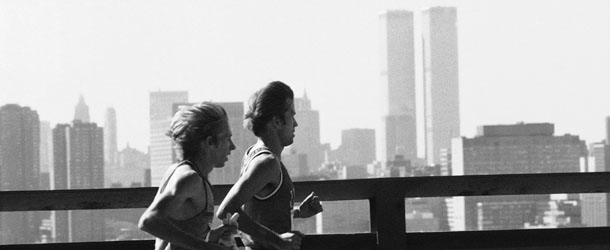 Bill Rodgers, left, of Boston and Chris Stewart of Great Britain pass by skyline of lower New York City during running of the New York Marathon in New York, Oct. 23, 1977. Rodgers, running with what he called &#8220;hardly any sleep the last few nights,&#8221; won the grueling race for the second straight year, while Stewart placed third. (AP Photo/Carlos Rene Perez)
