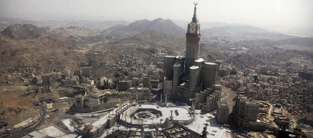 The tallest clock tower in the world with the world&#8217;s largest clock face at the Abraj Al-Bait Towers overlooks the Grand Mosque and its expansion in Mecca, Saudi Arabia, Wednesday, Oct. 16, 2013. More than 2 million pilgrims _ about 1 million fewer than last year _ perform the hajj, a central pillar of Islam and one that able-bodied Muslims must make once in their lives, is a four-day spiritual cleansing based on centuries of interpretation of the traditions of Prophet Muhammad. (AP Photo/Amr Nabil)
