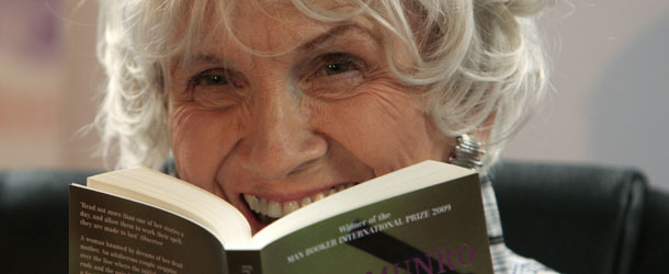 Canadian author Alice Munro holds one of her books as she receives her Man Booker International award at Trinity College Dublin, in Dublin, Ireland, on June 25, 2009. Canadian short story writer Alice Munro has won this year's Man Booker International Prize worth 60,000 pounds (95,000 US dollars, 70,000 euros). It is awarded every two years, and since its creation in 2005 has been given to Albania's Ismail Kadare and Nigeria's Chinua Achebe. The panel, which comprised writers Jane Smiley, Amit Chaudhuri and Andrey Kurkov, praised the 77-year-old for the originality and depth of her work. AFP PHOTO/ Peter Muhly (Photo credit should read PETER MUHLY/AFP/Getty Images)