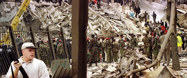 (FILES) Rescuers work to help survivors amid the devastation brought in by a bomb explosion in Al-Qaeda’s first major international attack near the US embassy and a bank in Nairobi ON August 7, 1998 that killed at least 60 people, including eight Americans, and left more than 1,000 injured. US President Barack Obama said on May 1, 2011 that justice had been done after the September 11, 2001 attacks with the death of Al-Qaeda mastermind Osama bin Laden, but warned that Al-Qaeda will still try to attack the US. AFP PHOTO / FILES (Photo credit should read AFP/AFP/Getty Images)
