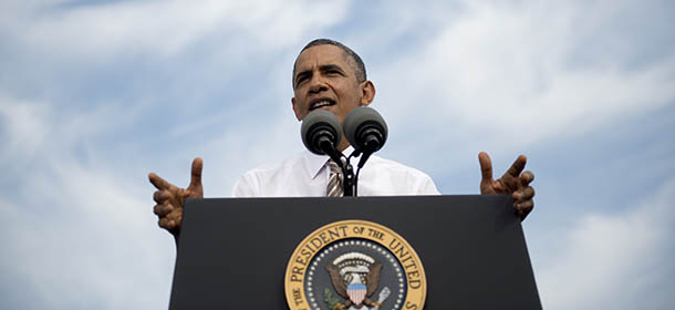 US President Barack Obama speaks on the government shutdown and the budget and debt ceiling debates in Congress during a visit to M. Luis Construction, a construction company, in Rockville, Maryland, October 3, 2013, on the third day of the government shutdown. AFP PHOTO / Saul LOEB (Photo credit should read SAUL LOEB/AFP/Getty Images)