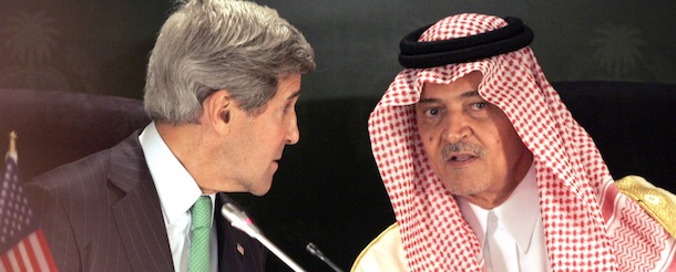 US Secretary of State John Kerry (L) and Saudi Foreign Minister Prince Saud al-Faisal (R) give a joint press conference in Jeddah, on June 25, 2013. Saudi Arabia pressed for global action to end Syrian President Bashar al-Assad&#8217;s regime, telling US Secretary of State John Kerry that the civil war had turned into &#8220;genocide&#8221;. AFP PHOTO/STR (Photo credit should read STR/AFP/Getty Images)
