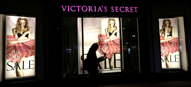 In this Thursday, Jan. 10, 2013, photo, a woman walks in front of a Victoria&#8217;s Secret store in Chicago. U.S. consumer confidence plunged in January to its lowest level in more than a year, reflecting higher Social Security taxes that left Americans with less take-home pay. (AP Photo/Nam Y. Huh)
