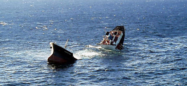 The Bahamas-registered &#8216;Prestige&#8217; oil tanker is seen broken in two some 150 miles off Spain&#8217;s coast in the Atlantic ocean Tuesday Nov. 19, 2002. The stricken tanker carrying 20 million gallons of oil split in two Tuesday and sank threatening an environmental disaster off the northwest coast of Spain and Portugal. (AP Photo/Douanes Francaise/Avion Polmar II) ** MANDATORY CREDIT **
