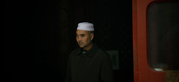 A muslim worshipper leaves Friday prayers at a mosque in Beijing on November 1, 2013. Festering discontent with China&#8217;s governance of Xinjiang is on the rise and Beijing is intent on clamping down, analysts say, in a vicious cycle that will only spin faster after a fatal attack in Tiananmen Square. AFP PHOTO / Ed Jones (Photo credit should read Ed Jones/AFP/Getty Images)
