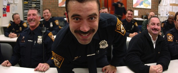 **ADVANCE FOR WEEKEND NOV. 22-23**Milford, Conn.,Police Department officer Jay Kranyak shows off his mustache on Thursday Nov. 13, 2008, as part of a prostate cancer fundraiser called &#8220;Movember.&#8221; It&#8217;s named for the Aussie word for mustache, Mo.The officers said their mustaches of various shapes and sizes have been great conversation starters about men&#8217;s health, and have helped the team raise about $850 so far for the Prostate Cancer Foundation. (AP Photo/ Christian Abraham/Connecticut Post)
