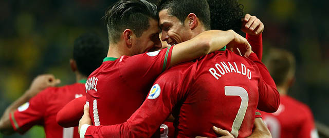 (L) of Sweden battles for the ball with of Portugal during the FIFA 2014 World Cup Qualifier Play-off Second Leg match between Sweden and Portugal at Friends Arena on November 19, 2013 in Stockholm, Sweden.