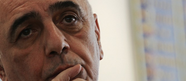 Milan, ITALY: Adriano Galliani, president of professional league clubs and AC Milan vice-president answers journalists questions during press conference at the Italian football league headquarter in Milan, 24 May 2006, after an extraordinary assembly. Public prosecutors in Turin have ordered the seizure of financial documents concerning the transfer of 41 players by Juventus in the latest development of the scandal embroiling Italy's top club. AFP PHOTO / Paco SERINELLI (Photo credit should read PACO SERINELLI/AFP/Getty Images)