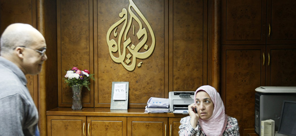 Al-Jazeera employees work at the pan-Arab television channel's bureau in Cairo on January 30, 2011. Egypt has ordered a shutdown of Al-Jazeera's operations, the official MENA news agency said, after the channel gave blanket coverage to ongoing anti-government protests. AFP PHOTO/MOHAMMED ABED (Photo credit should read MOHAMMED ABED/AFP/Getty Images)