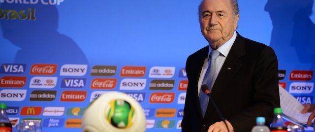 Fifa president Joseph Blatter gestures during a press conference in Costa do Sauipe, state of Bahia, Brazil on December 3, 2013. The 2014 FIFA World Cup Brazil final draw will take place December 6. AFP PHOTO/VANDERLEI ALMEIDA (Photo credit should read VANDERLEI ALMEIDA/AFP/Getty Images)