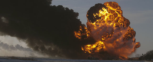 A fireball goes up at the site of an oil train derailment Monday, Dec 30, 2013, in Casselton, N.D. The train carrying crude oil derailed near Casselton Monday afternoon. Several explosions were reported as some cars on the mile-long train caught fire. (AP Photo/Bruce Crummy)