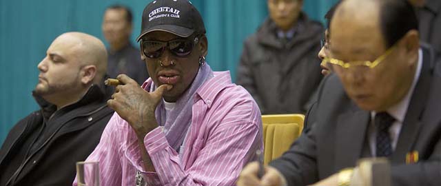 Former NBA basketball star Dennis Rodman watches from court side during a practice session for North Korean basketball players in Pyongyang, North Korea on Friday, Dec. 20, 2013. Rodman selected the members of the North Korean team who will play in Pyongyang against visiting NBA stars on Jan. 8, 2014, the birthday of North Korean leader Kim Jong Un. (AP Photo/David Guttenfelder)