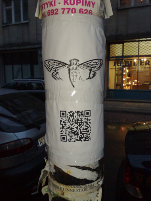 (http://en.m.wikipedia.org/wiki/File:Cicada_3301_Poster_Warsaw.jpg)