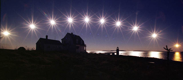 The sun, nearing winter solstice, travels low across the sky, from sunrise, at left, to sunset, in this multiple-exposure made at the Marshall Point Light, Wednesday, Dec. 18, 2002, in St. George, Maine. The sun's position is recorded at 50-minute intervals during the short nine-hour day. (AP Photo/Robert F. Bukaty)