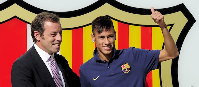 FC Barcelona's new player Brazilian Neymar da Silva Santos Junior (R) poses with Barcelona's President Sandro Rosell at Camp Nou stadium in Barcelona, on June 3, 2013. Santos and Brazil star Neymar signed a five-year contract with Spanish giants Barcelona. AFP PHOTO/ JOSEP LAGO (Photo credit should read JOSEP LAGO/AFP/Getty Images)