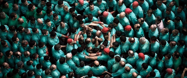 The human towers (“castells” in Catalan) are built traditionally in festivities and competitions in Catalonia, Spain. At these events each team (“colla”) builds and dismantles several human towers. For their success, a crowded and stunning base of dozens of people needs to be previously perfectly set up.