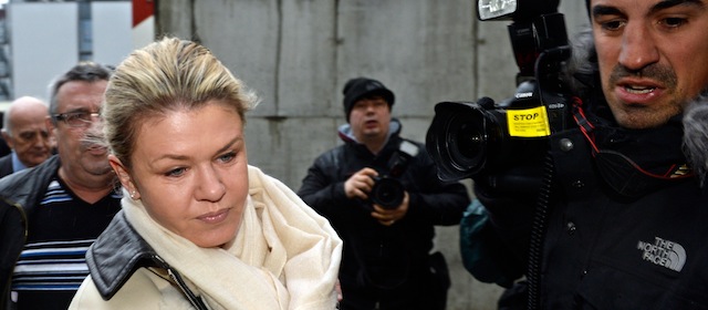 Corinna Schumacher (3rd L), the wife of German Formula One world champion Michael Schumacher, arrives on January 3, 2014 at the Grenoble University Hospital Centre with French surgeon professor Gerard Saillant (L), to visit her husband. Schumacher remained "stable" but was still in a critical condition on January 3 as he spent his 45th birthday lying in a coma for a fifth day in a French hospital following a skiing accident. AFP PHOTO/PHILIPPE DESMAZES (Photo credit should read PHILIPPE DESMAZES/AFP/Getty Images)