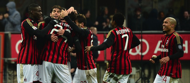 AC Milan's midfielder Cristante Bryan celebrates with teammates after scoring a goal with AC Milan's Brazilian forward Robinho (top) during the Serie A football match between AC Milan and Atalanta at San Siro Stadium in Milan on January 6, 2014. AFP PHOTO / GIUSEPPE CACACE (Photo credit should read GIUSEPPE CACACE/AFP/Getty Images)