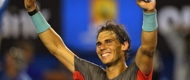 Spain's Rafael Nadal celebrates his victory against Switzerland's Roger Federer during their men's singles semi-final match on day 12 of the 2014 Australian Open tennis tournament in Melbourne on January 24, 2014. IMAGE RESTRICTED TO EDITORIAL USE - STRICTLY NO COMMERCIAL USE AFP PHOTO / SAEED KHAN (Photo credit should read SAEED KHAN/AFP/Getty Images)