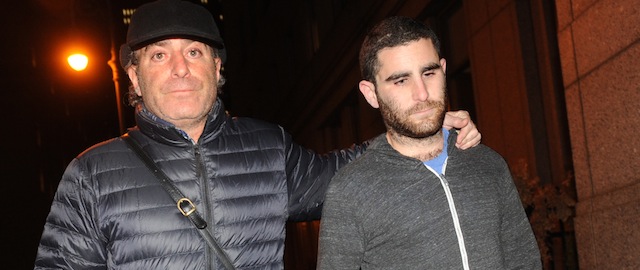 Charlie Shrem, right, 24, exits Manhattan federal court with an unidentified person, Monday, Jan. 27, 2014, in New York. Shrem, the chief executive officer of BitInstant and vice chairman of a foundation that promotes the Bitcoin currency system, was arrested Sunday at New York's Kennedy Airport .(AP Photo/ Louis Lanzano)