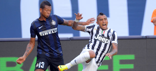 Inter Milan midfielder Fredy Guarin (13) and Juventus F.C. midfielder Arturo Vidal (23) go for a ball during the Guinness International Champions at Sun Life Stadium on Tuesday Aug. 6, 2013 in Miami Gardens, Florida. 
(Scott A. Miller / AP Images for Guinness International Champions Cup)